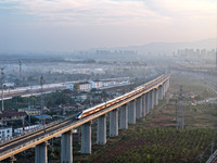 A bullet train runs in Lianyungang, China, on October 9, 2024. (