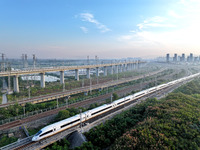 A bullet train runs in Lianyungang, China, on October 9, 2024. (