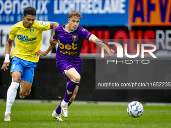 RKC player Richonell Margaret and Go Ahead Eagles player Pim Saathof participate in the friendly match between RKC and Go Ahead Eagles at th...