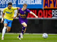 RKC player Richonell Margaret and Go Ahead Eagles player Pim Saathof participate in the friendly match between RKC and Go Ahead Eagles at th...