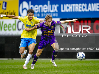 RKC player Richonell Margaret and Go Ahead Eagles player Pim Saathof participate in the friendly match between RKC and Go Ahead Eagles at th...