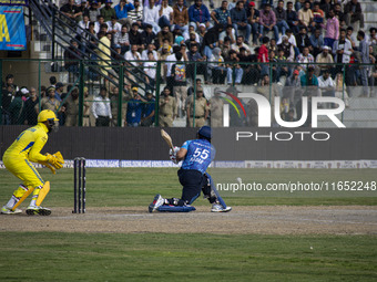 India's Kedar Jadhav plays a shot during the Legends League Cricket match between Toyam Hyderabad and Southern Super Stars in Srinagar, Jamm...