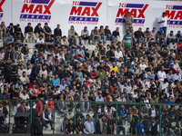 Spectators watch a cricket match during the Legends League Cricket match between Toyam Hyderabad and Southern Super Stars in Srinagar, Jammu...