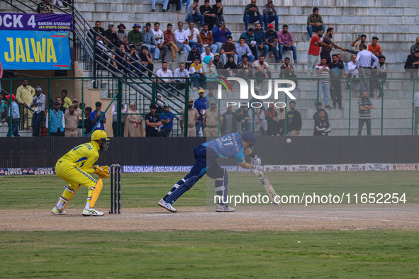 New Zealand's Martin Guptill plays a shot during the Legends League Cricket match between Toyam Hyderabad and Southern Super Stars in Srinag...