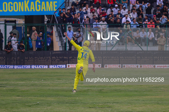 India's Ravi Jangid takes a catch during the Legends League Cricket match between Toyam Hyderabad and Southern Super Stars in Srinagar, Jamm...