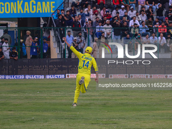 India's Ravi Jangid takes a catch during the Legends League Cricket match between Toyam Hyderabad and Southern Super Stars in Srinagar, Jamm...