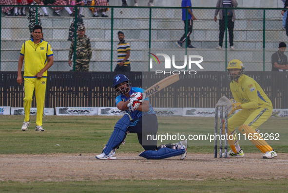 India's Kedar Jadhav plays a shot during the Legends League Cricket match between Toyam Hyderabad and Southern Super Stars in Srinagar, Jamm...