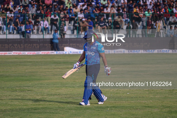 India's Kedar Jadhav walks off after being dismissed by Shivakant Shukla of India during the Legends League Cricket match between Toyam Hyde...