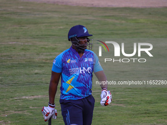 Zimbabwe's Elton Chigumbura walks off after being dismissed during the Legends League Cricket match between Toyam Hyderabad and Southern Sup...