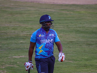 Zimbabwe's Elton Chigumbura walks off after being dismissed during the Legends League Cricket match between Toyam Hyderabad and Southern Sup...