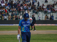 New Zealand's Martin Guptill walks off after being dismissed by Ravi Jangid of India during the Legends League Cricket match between Toyam H...