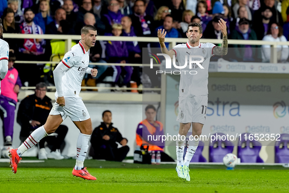 Christian Pulisic of AC Milan celebrates after scoring first goal during the Serie A Enilive match between ACF Fiorentina and AC Milan at St...