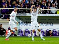 Christian Pulisic of AC Milan celebrates after scoring first goal during the Serie A Enilive match between ACF Fiorentina and AC Milan at St...