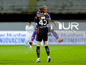 David De Gea of ACF Fiorentina celebrates with Dodo  after Albert Gudmundsson scored second goal during the Serie A Enilive match between AC...