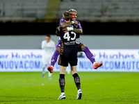 David De Gea of ACF Fiorentina celebrates with Dodo  after Albert Gudmundsson scored second goal during the Serie A Enilive match between AC...