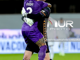 David De Gea of ACF Fiorentina celebrates with Dodo  after Albert Gudmundsson scored second goal during the Serie A Enilive match between AC...