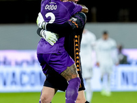 David De Gea of ACF Fiorentina celebrates with Dodo  after Albert Gudmundsson scored second goal during the Serie A Enilive match between AC...