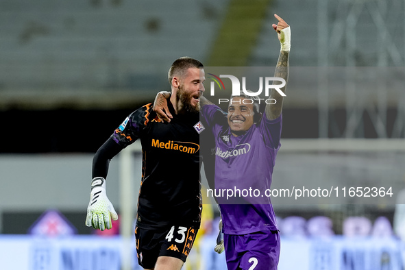 David De Gea of ACF Fiorentina celebrates with Dodo  after Albert Gudmundsson scored second goal during the Serie A Enilive match between AC...