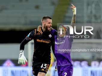 David De Gea of ACF Fiorentina celebrates with Dodo  after Albert Gudmundsson scored second goal during the Serie A Enilive match between AC...