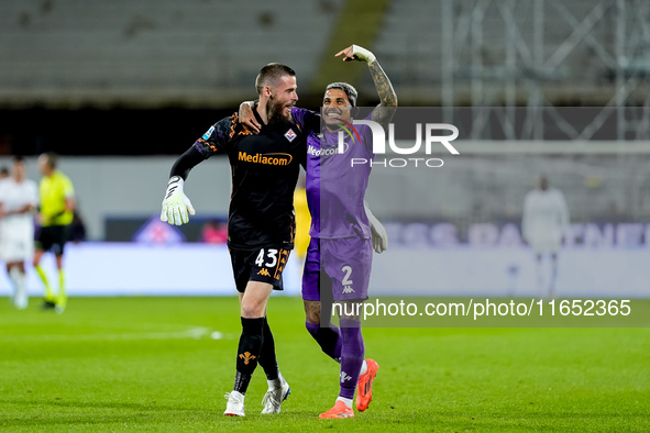 David De Gea of ACF Fiorentina celebrates with Dodo  after Albert Gudmundsson scored second goal during the Serie A Enilive match between AC...