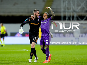 David De Gea of ACF Fiorentina celebrates with Dodo  after Albert Gudmundsson scored second goal during the Serie A Enilive match between AC...