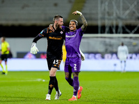 David De Gea of ACF Fiorentina celebrates with Dodo  after Albert Gudmundsson scored second goal during the Serie A Enilive match between AC...