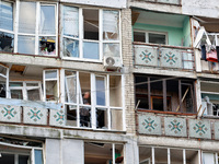 A man stands on the balcony of a residential building damaged by a Russian drone attack in Chornomorsk, Odesa region, southern Ukraine, on O...