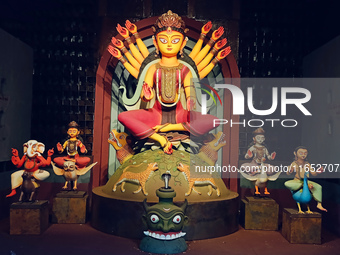 An idol of Durga is seen at a pandal during the Durga Puja festival in Kolkata, India, on October 9, 2024. (