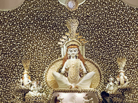 An idol of the Hindu goddess Durga is placed on an altar inside a pandal, marking Durga Puja festival celebrations in Kolkata, India, on Oct...