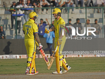 Peter Trego (L) and George Worker (R) of Toyam Hyderabad react during the Legends League Cricket T20 match between Toyam Hyderabad and South...