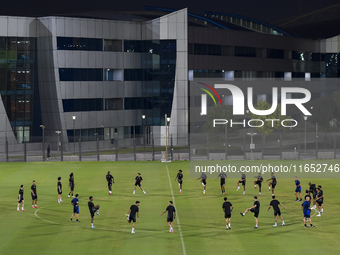 Players of the Qatar National team train at Aspire Academy in Doha, Qatar, on October 9, 2024, ahead of the FIFA World Cup 2026 Qualificatio...