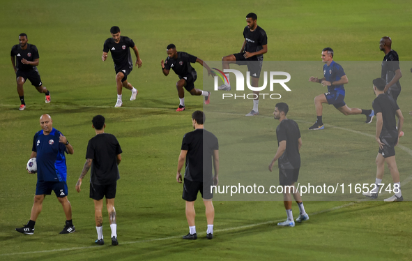 Players of the Qatar National team train at Aspire Academy in Doha, Qatar, on October 9, 2024, ahead of the FIFA World Cup 2026 Qualificatio...