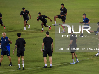 Players of the Qatar National team train at Aspire Academy in Doha, Qatar, on October 9, 2024, ahead of the FIFA World Cup 2026 Qualificatio...