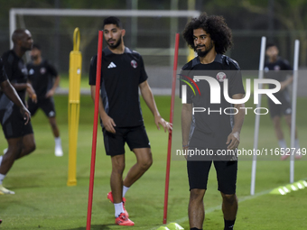 Akram Afif from the Qatar National football team attends a training session at Aspire Academy in Doha, Qatar, on October 9, 2024, ahead of t...