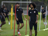 Akram Afif from the Qatar National football team attends a training session at Aspire Academy in Doha, Qatar, on October 9, 2024, ahead of t...