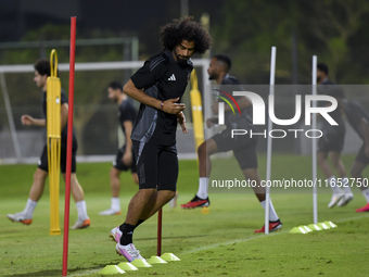 Akram Afif from the Qatar National football team attends a training session at Aspire Academy in Doha, Qatar, on October 9, 2024, ahead of t...