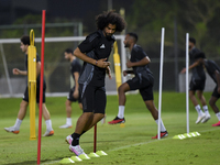 Akram Afif from the Qatar National football team attends a training session at Aspire Academy in Doha, Qatar, on October 9, 2024, ahead of t...