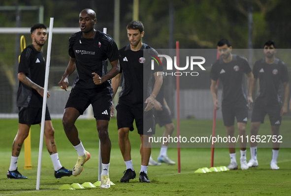 Abdelkarim Hassan from the Qatar National football team attends a training session at Aspire Academy in Doha, Qatar, on October 9, 2024, ahe...