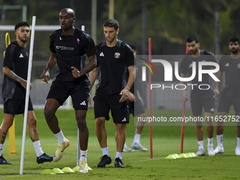 Abdelkarim Hassan from the Qatar National football team attends a training session at Aspire Academy in Doha, Qatar, on October 9, 2024, ahe...