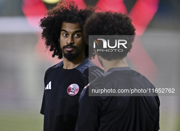 Akram Afif from the Qatar National football team attends a training session at Aspire Academy in Doha, Qatar, on October 9, 2024, ahead of t...