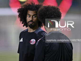 Akram Afif from the Qatar National football team attends a training session at Aspire Academy in Doha, Qatar, on October 9, 2024, ahead of t...