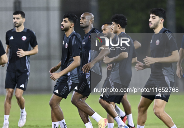 Players of the Qatar National team train at Aspire Academy in Doha, Qatar, on October 9, 2024, ahead of the FIFA World Cup 2026 Qualificatio...