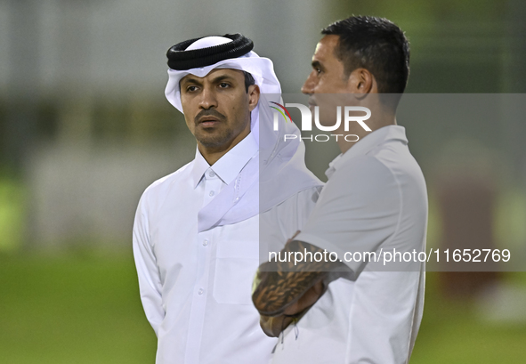 The President of the Qatar Football Association, Jassim bin Rashid Al-Boenain, participates in a training session at Aspire Academy in Doha,...