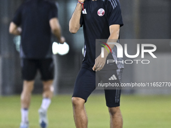 Akram Afif from the Qatar National football team attends a training session at Aspire Academy in Doha, Qatar, on October 9, 2024, ahead of t...