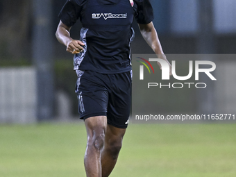 Abdelkarim Hassan from the Qatar National football team attends a training session at Aspire Academy in Doha, Qatar, on October 9, 2024, ahe...