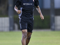 Abdelkarim Hassan from the Qatar National football team attends a training session at Aspire Academy in Doha, Qatar, on October 9, 2024, ahe...