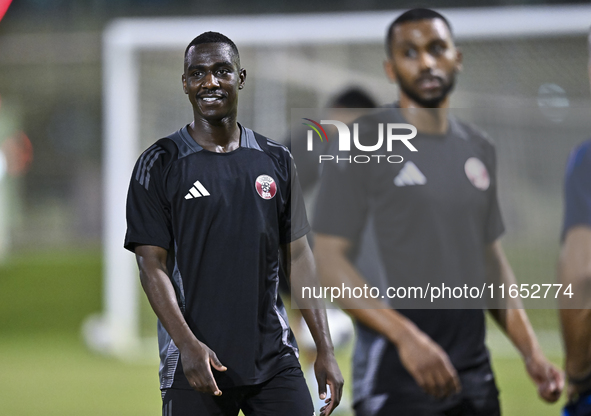 Al Moez Ali from the Qatar National football team attends a training session at Aspire Academy in Doha, Qatar, on October 9, 2024, ahead of...