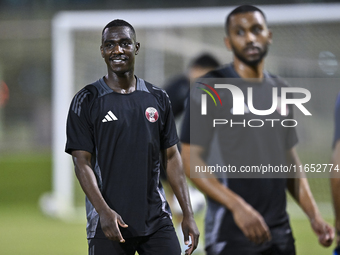 Al Moez Ali from the Qatar National football team attends a training session at Aspire Academy in Doha, Qatar, on October 9, 2024, ahead of...