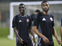 Al Moez Ali from the Qatar National football team attends a training session at Aspire Academy in Doha, Qatar, on October 9, 2024, ahead of...