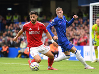 Alex Moreno of Nottingham Forest shields the ball from Cole Palmer of Chelsea during the Premier League match between Chelsea and Nottingham...